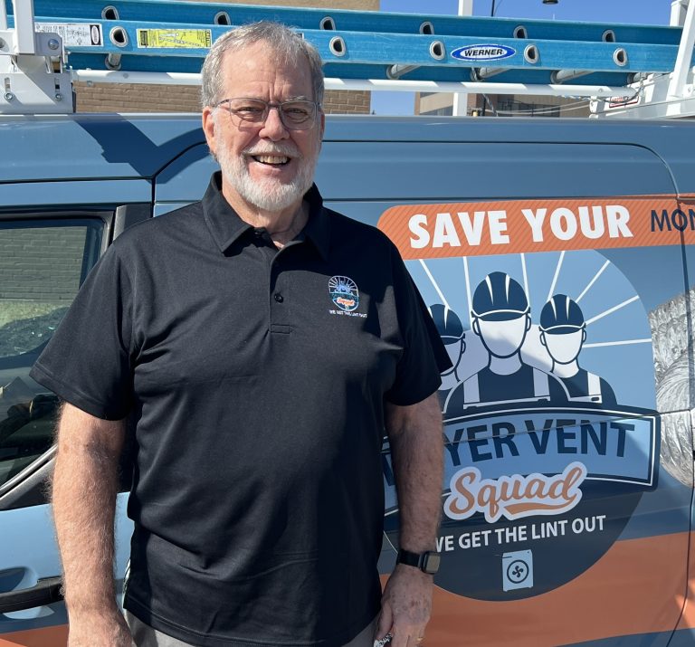 Bill, owner of Dryer Vent Squad of Northern Illinois, standing by his service van